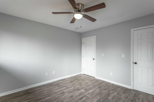 unfurnished bedroom featuring wood-type flooring and ceiling fan