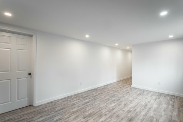 basement featuring light hardwood / wood-style floors