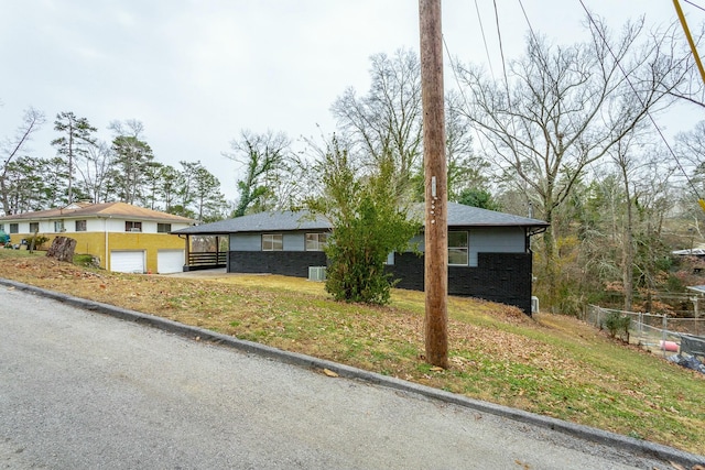 view of front of home with a front lawn