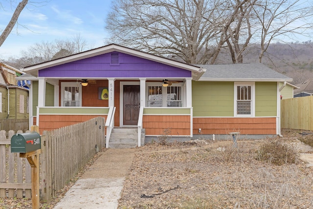 bungalow featuring ceiling fan and a porch