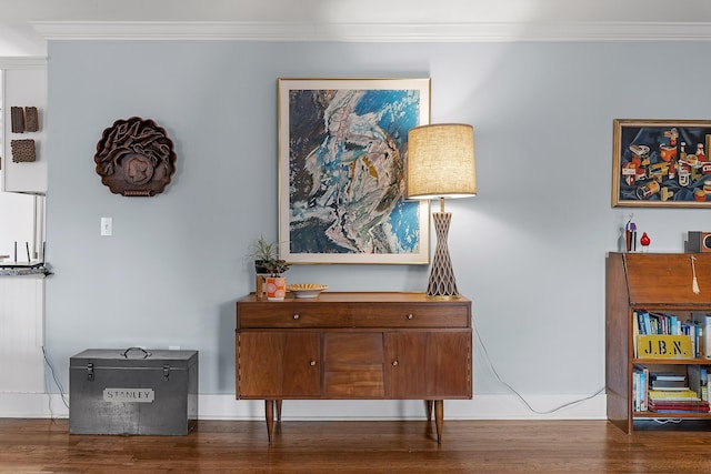 details featuring hardwood / wood-style flooring and crown molding