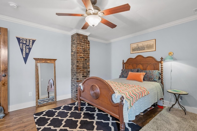 bedroom featuring ornamental molding, dark hardwood / wood-style floors, and ceiling fan