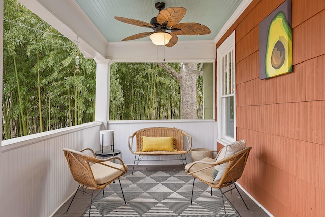 exterior space with ceiling fan