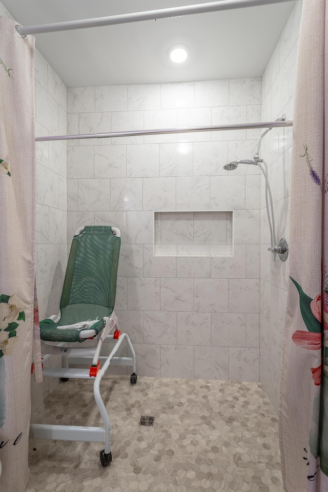 bathroom featuring a shower with curtain