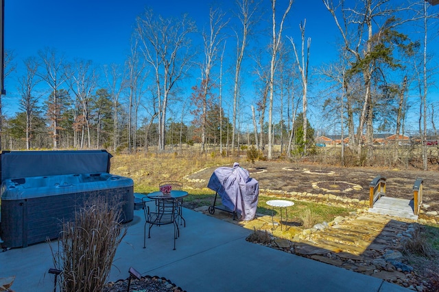 view of patio featuring a hot tub