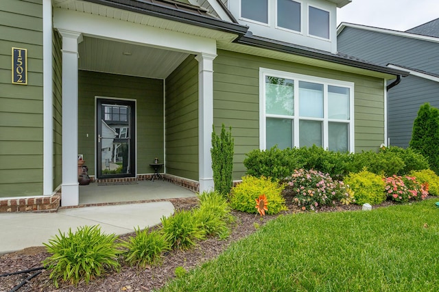 entrance to property with covered porch