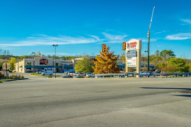 1502 Buttonwood Loop, Chattanooga, TN 37421 - view of asphalt street with traffic signs