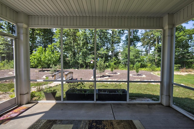 1502 Buttonwood Loop, Chattanooga, TN 37421 - unfurnished sunroom with view of scattered trees