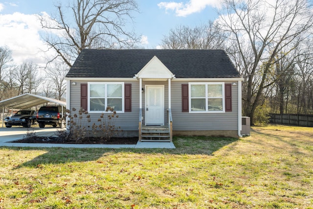 bungalow-style house with a carport, central AC unit, and a front yard