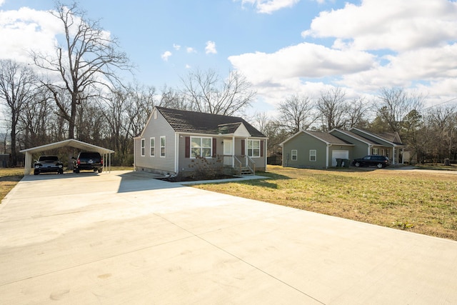 view of front facade featuring a front yard and a carport