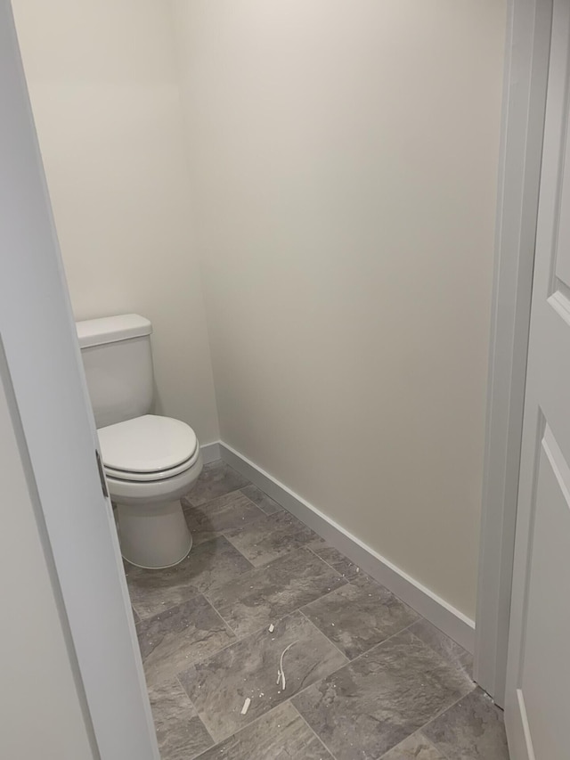 bathroom featuring toilet