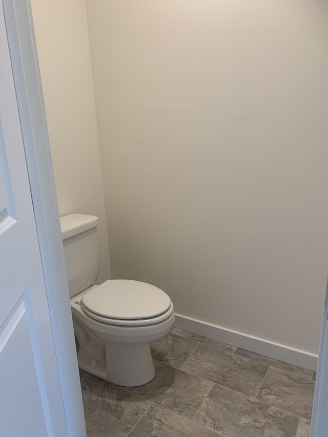 bathroom featuring toilet