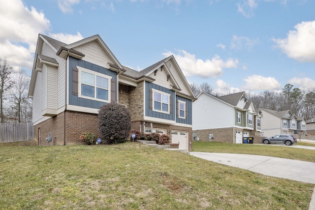 view of front of home with a garage and a front yard