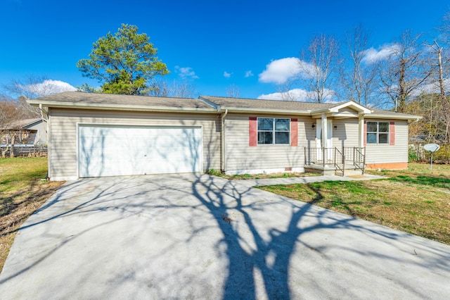 single story home with a garage and a front yard