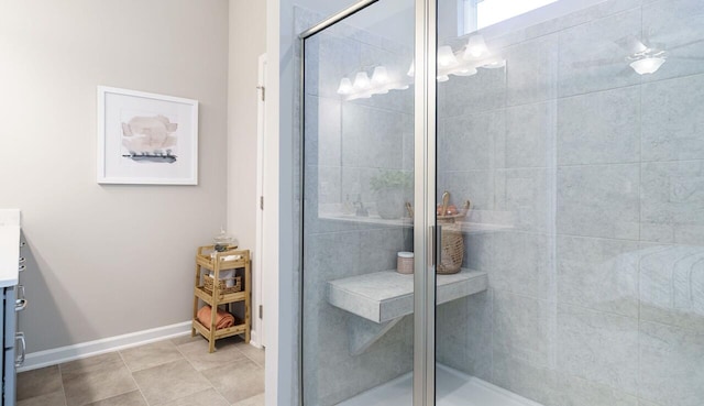 bathroom with vanity, an enclosed shower, and tile patterned floors