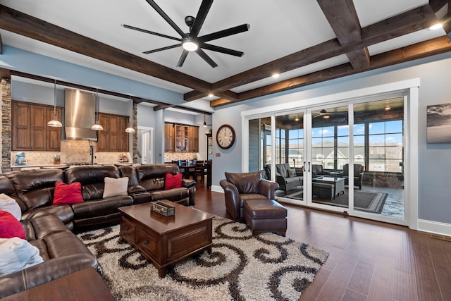 living room with dark hardwood / wood-style flooring, beam ceiling, coffered ceiling, and ceiling fan