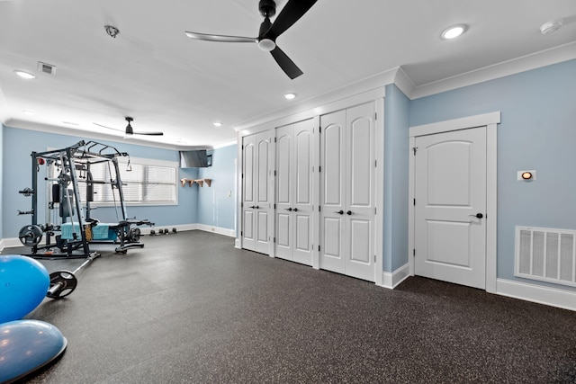 workout room featuring crown molding and ceiling fan