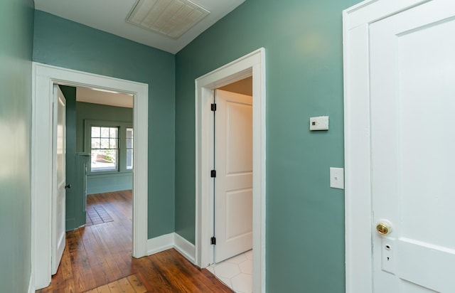 hallway featuring hardwood / wood-style floors