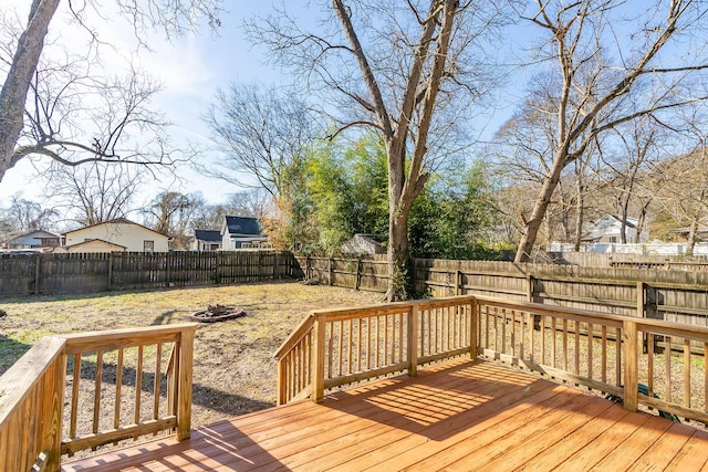 wooden deck featuring a fire pit