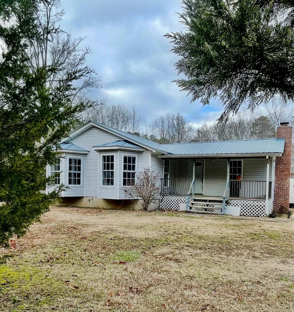 1991 Fullers Chapel Rd, Chatsworth, GA 30705 - ranch-style house featuring a porch and a front yard