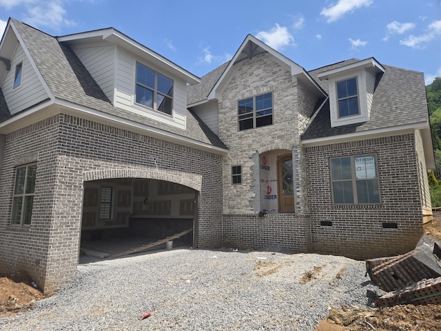 9892 Trestle Cir Unit 50, Ooltewah, TN 37363 - view of front of property featuring brick siding, gravel driveway, and a shingled roof