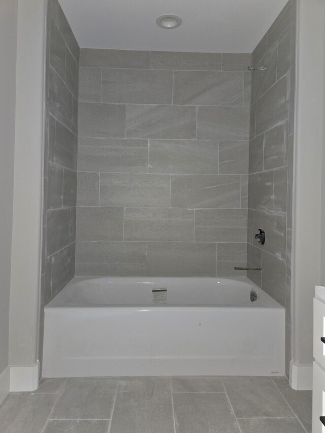 9892 Trestle Cir Unit 50, Ooltewah, TN 37363 - bathroom featuring shower / washtub combination, baseboards, tile patterned flooring, and vanity