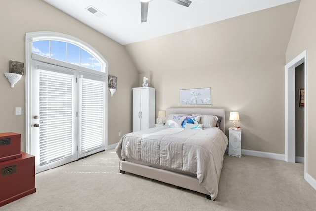 bedroom with vaulted ceiling, light colored carpet, ceiling fan, and access to outside