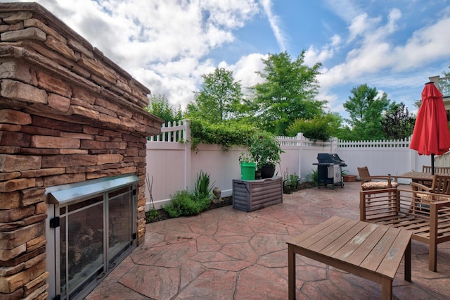 8625 Homecoming Dr, Chattanooga, TN 37421 - view of patio featuring grilling area and a fenced backyard