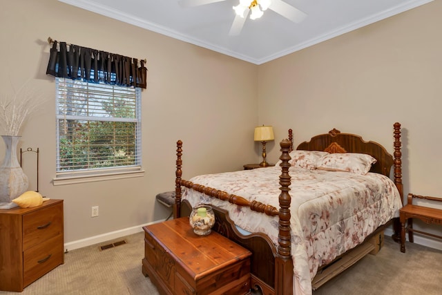 carpeted bedroom featuring ornamental molding and ceiling fan