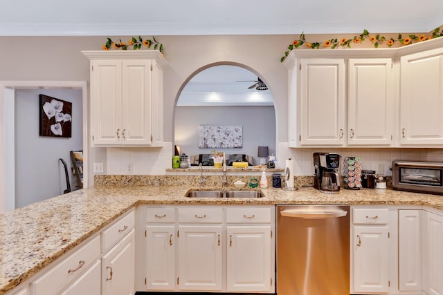 kitchen with white cabinetry, sink, and dishwasher