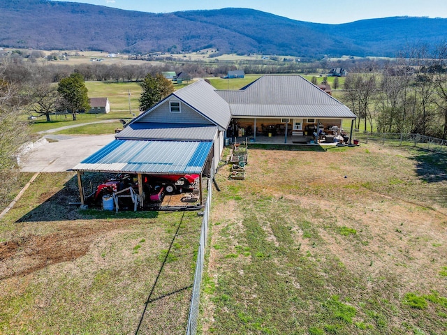 drone / aerial view featuring a mountain view