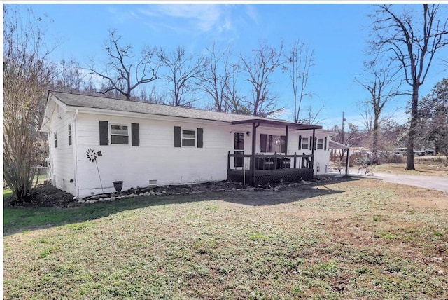 single story home featuring a front yard and covered porch