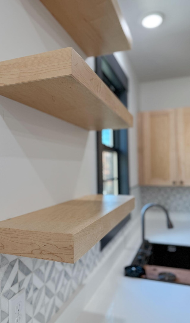 kitchen featuring light brown cabinets