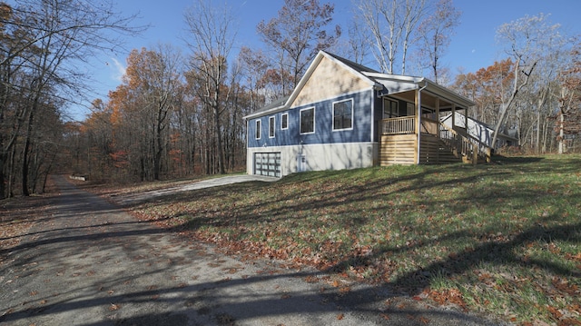 view of property exterior with covered porch