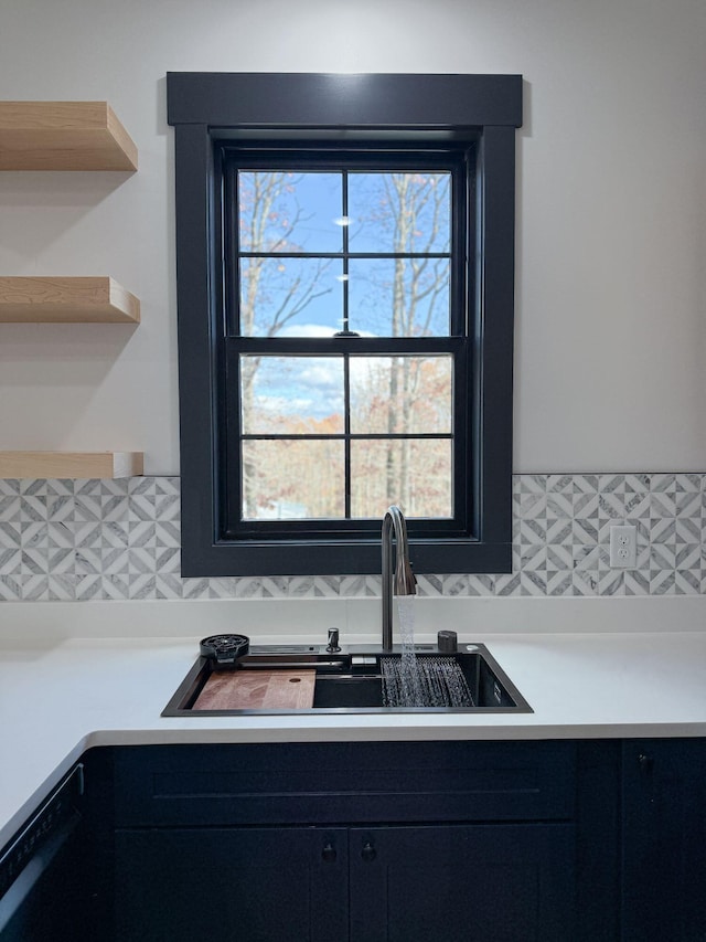 kitchen featuring sink and decorative backsplash