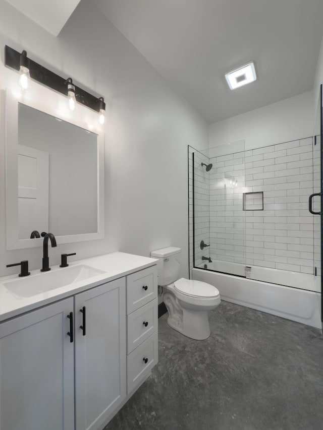 full bathroom with toilet, vanity, and shower / bath combination with glass door