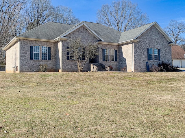 view of front of home with a front yard