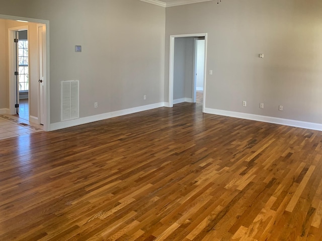 unfurnished room with dark hardwood / wood-style floors