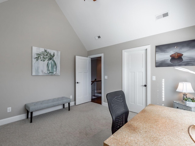 carpeted office with high vaulted ceiling