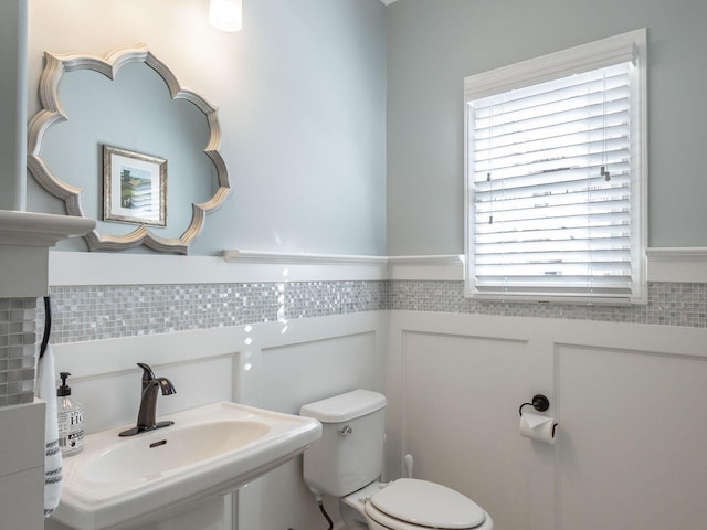 bathroom with toilet and sink