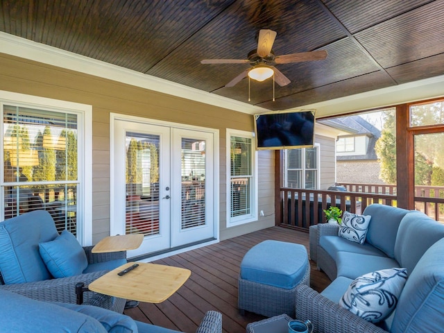 sunroom with french doors, ceiling fan, and wood ceiling