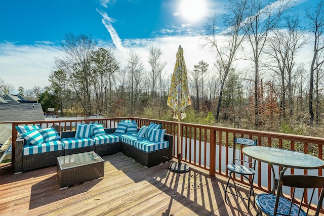 deck featuring outdoor lounge area