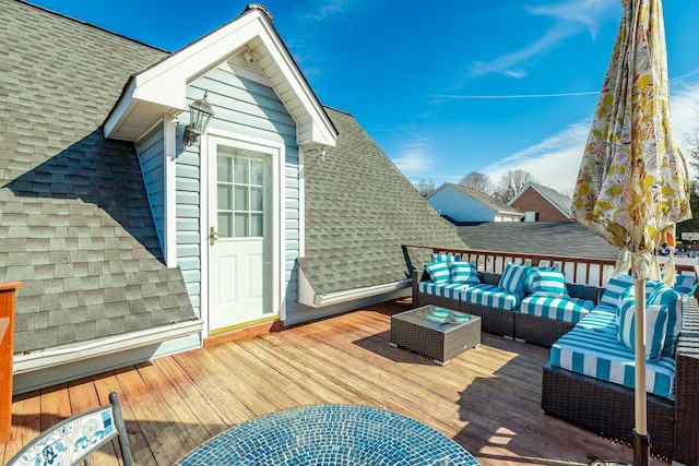 wooden deck featuring outdoor lounge area