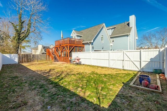 view of yard featuring a deck