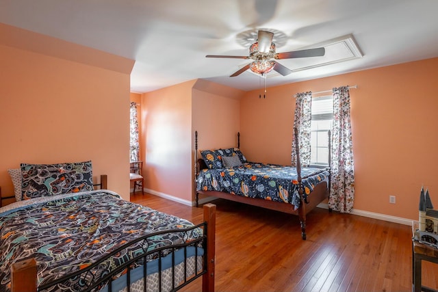 bedroom featuring ceiling fan and hardwood / wood-style floors