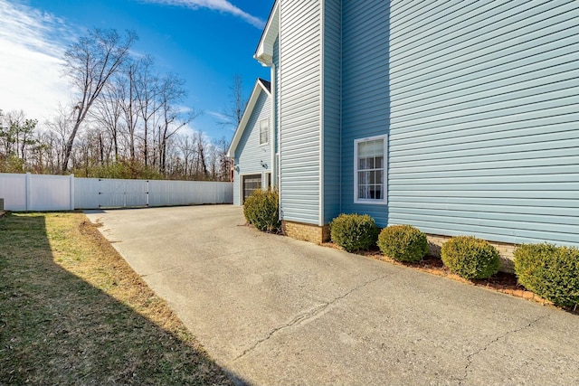 view of property exterior featuring a garage