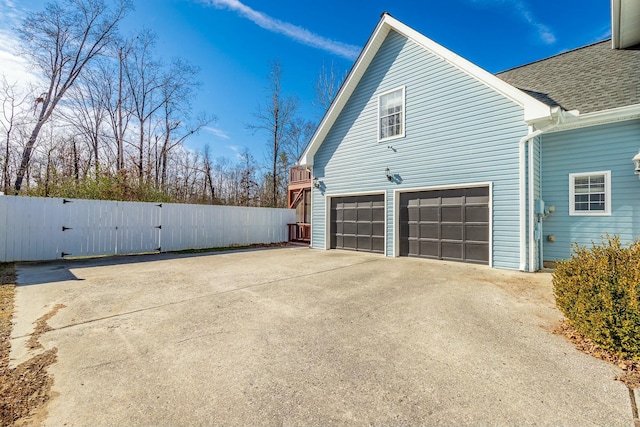 view of home's exterior with a garage