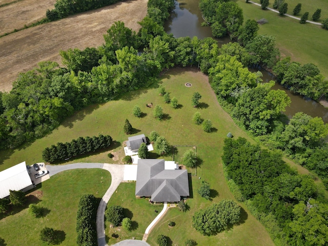 drone / aerial view with a rural view and a water view