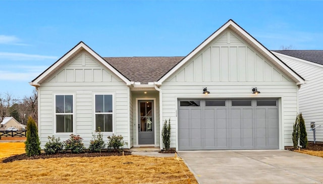 view of front facade with a garage and a front lawn