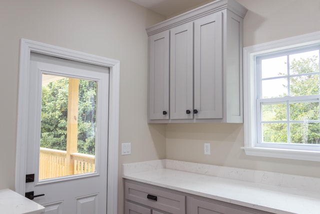 interior space featuring light stone countertops